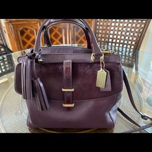 Beautiful burgundy half-calf flap and leather Coach bag.